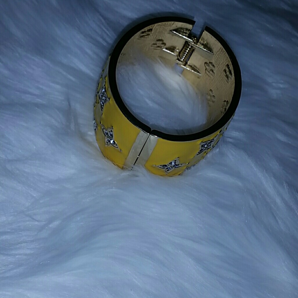 Bold statement piece! Yellow and gold bangle