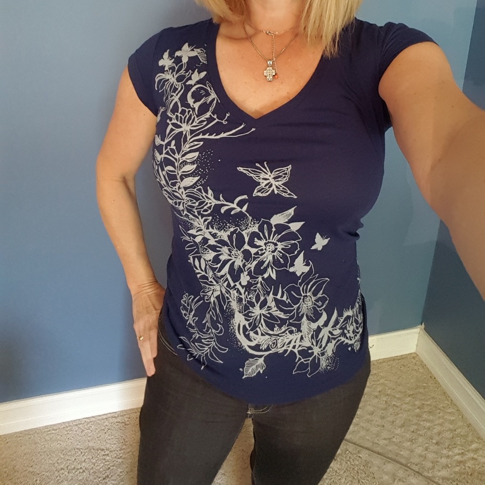 Blue t shirt  with pale gray floral design