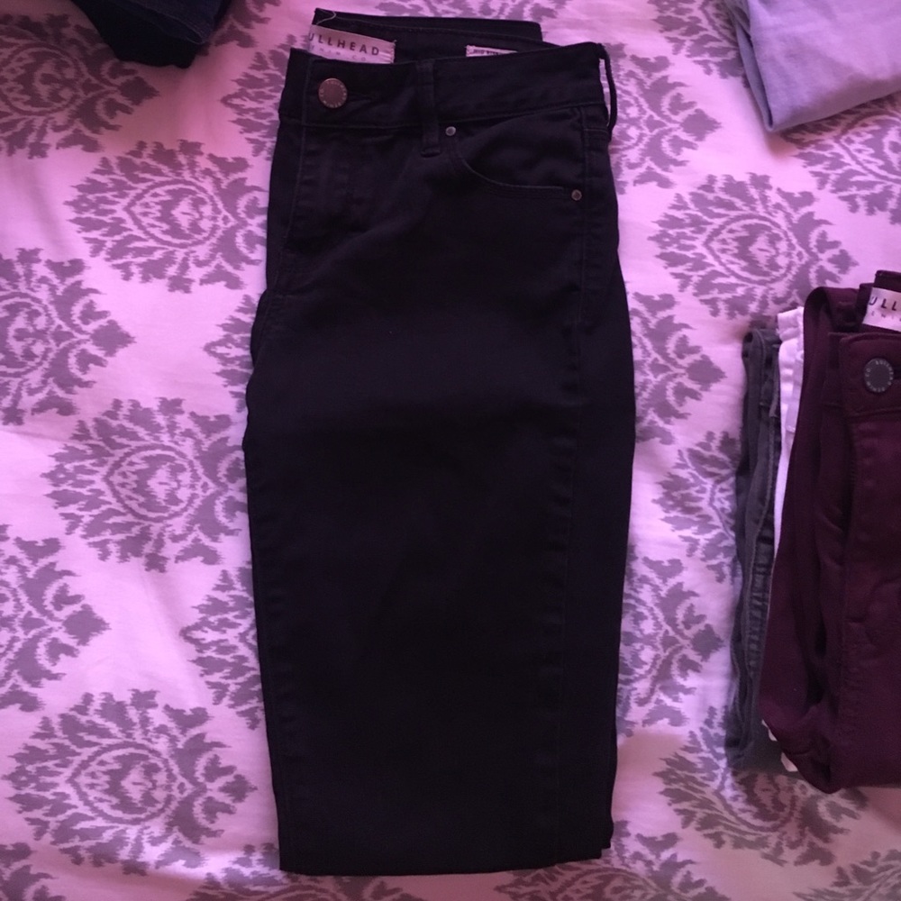 Plain black skinny jeans (no rips/distress)