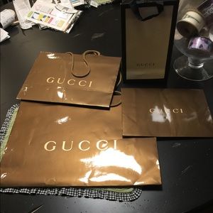 Gucci shopping bags used to take home purchases
