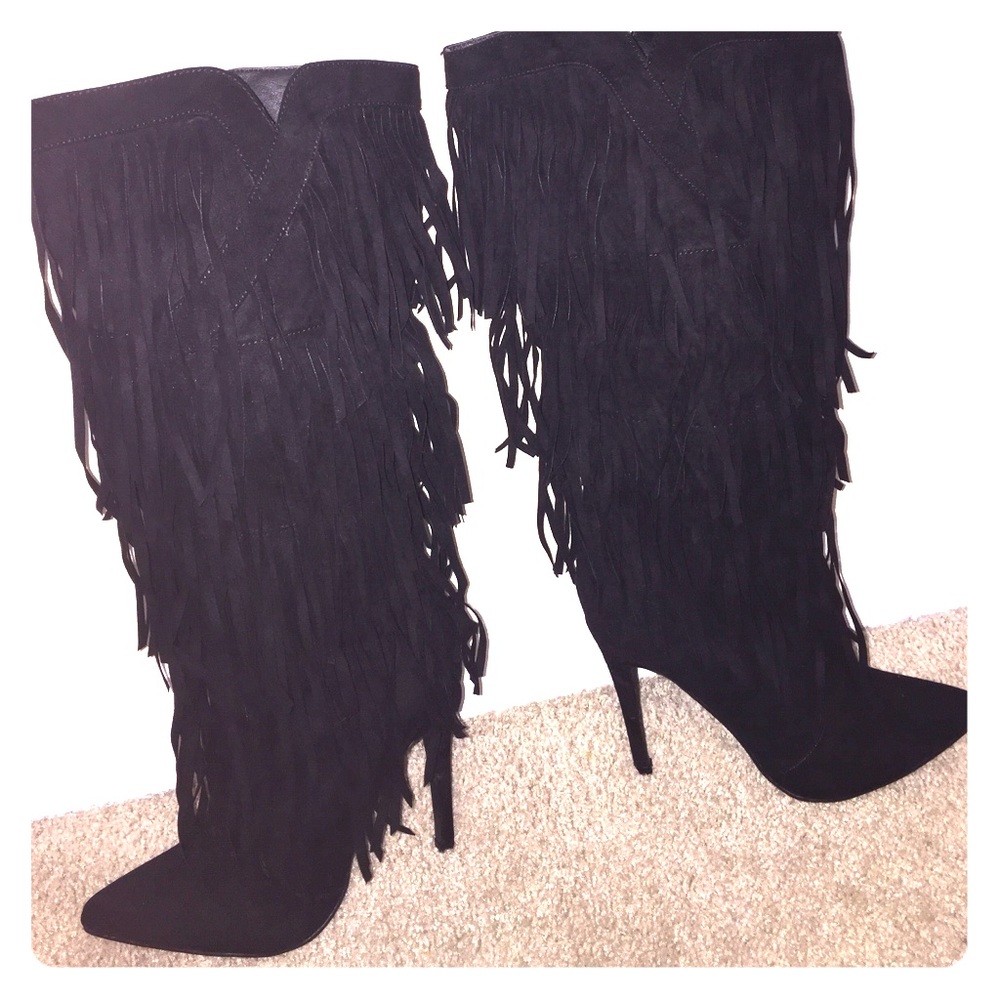 Black heeled ruffle boots