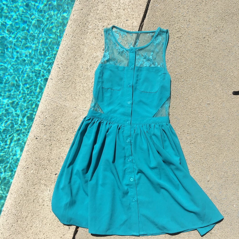 Super cute teal skater style dress!