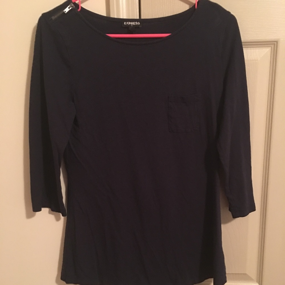 Navy express top with pocket and zipper accent