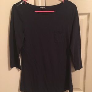 Navy express top with pocket and zipper accent