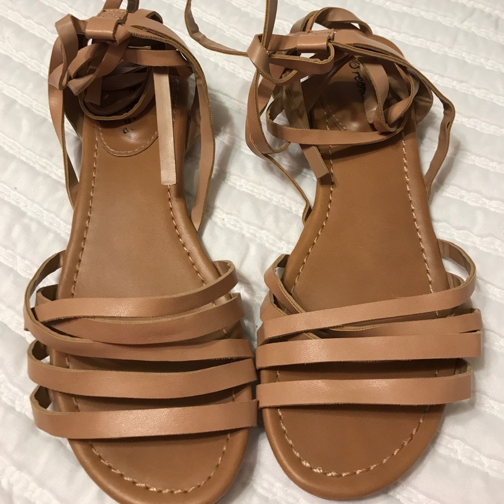 Lace up sandals in neutral tan 7