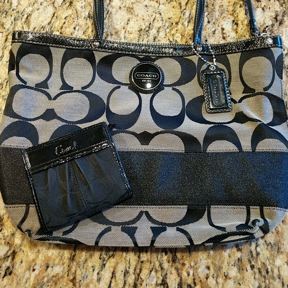 Black and gray Coach purse and wallet