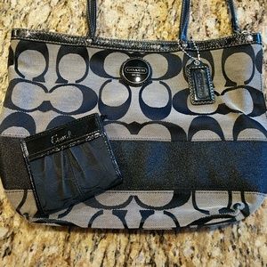 Black and gray Coach purse and wallet