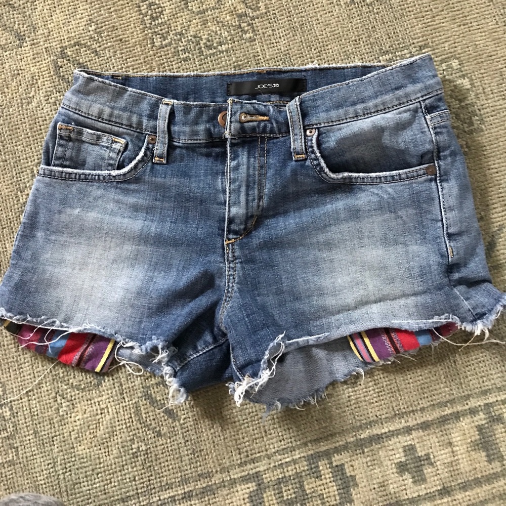 Joe's jean shorts with striped pockets that peek