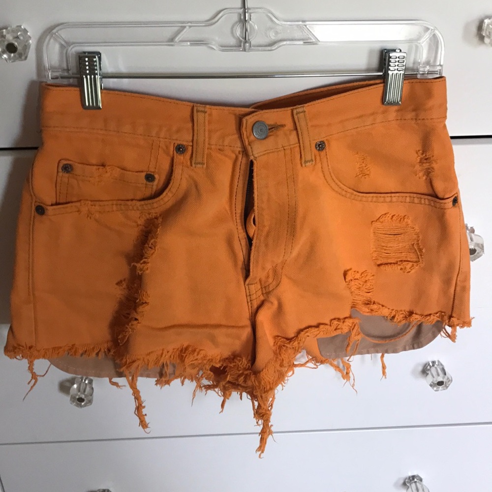 Orange vintage denim cutoff shorts