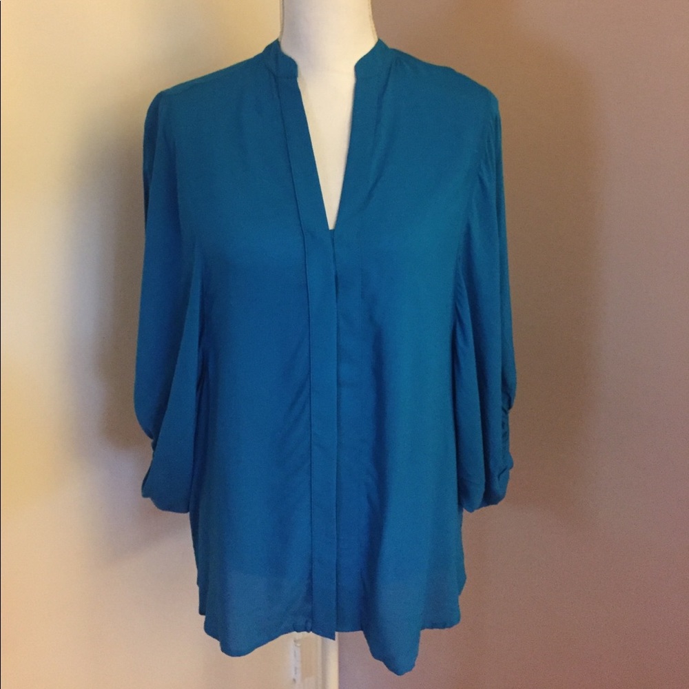 Express bell sleeve blouse