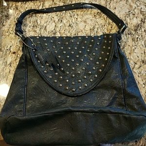 Leather, gold studded purse
