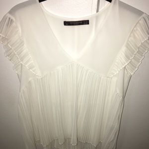 Zara White short sleeved pleated blouse.