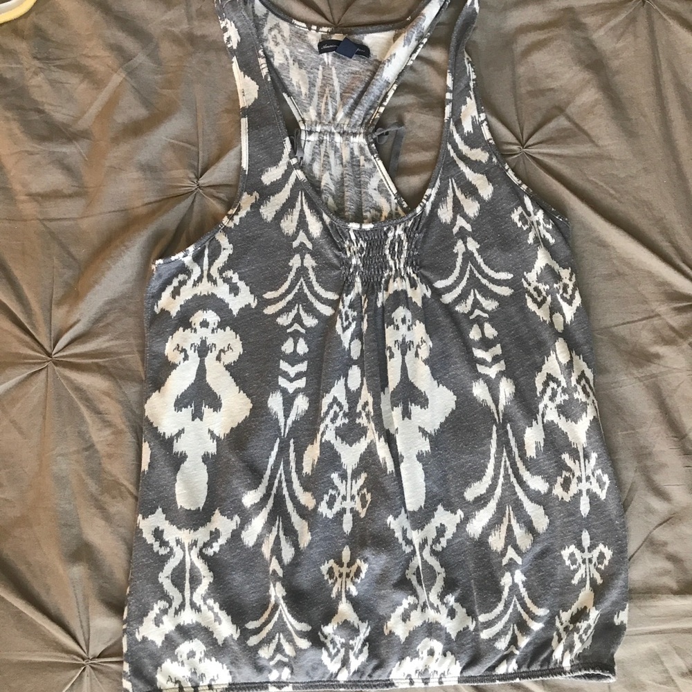 Grey, white tank