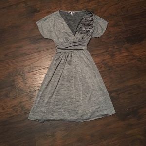 Grey dress with tie and flower accent