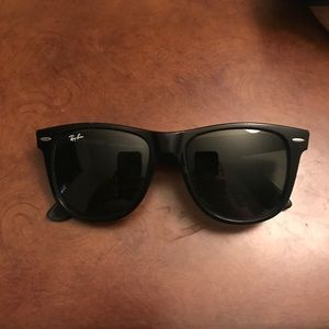 All black Ray Bans