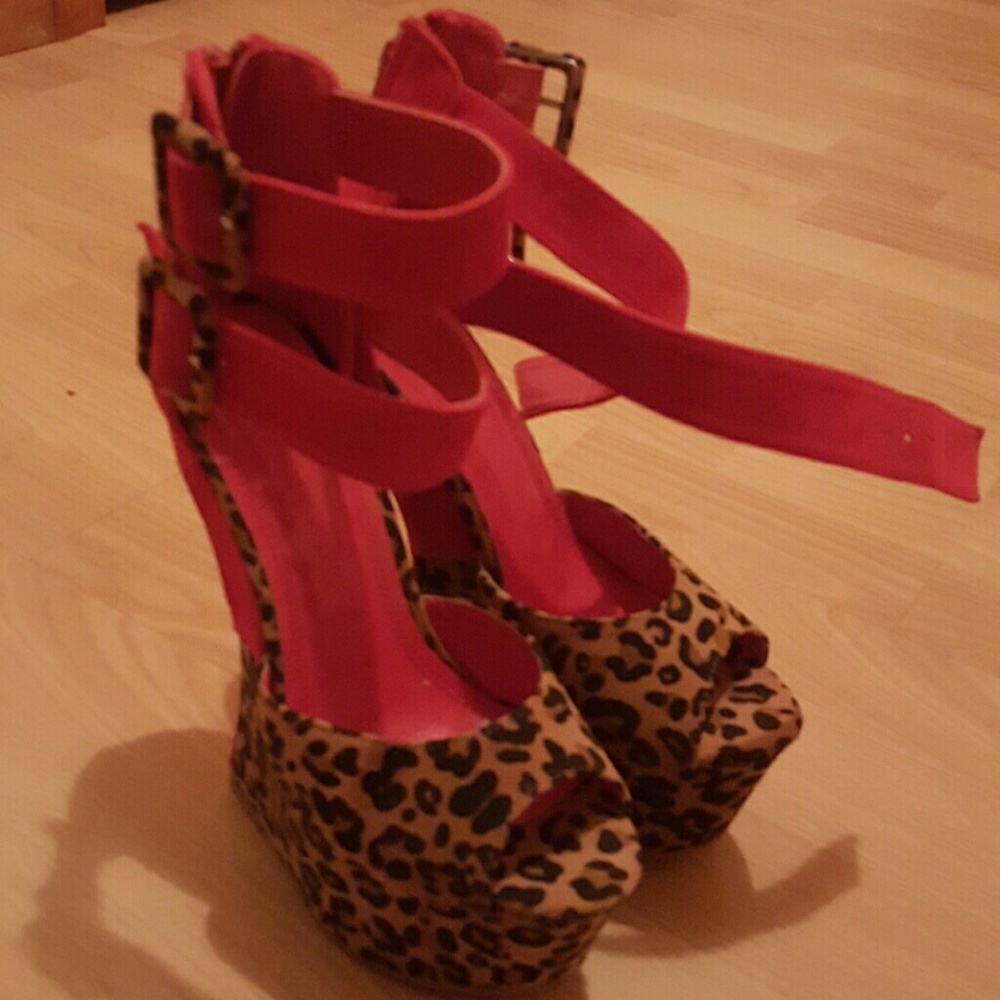 Red and Leopard wedges size 6.5. Never worn