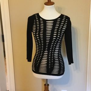 Express sweater. Black with beige underlay