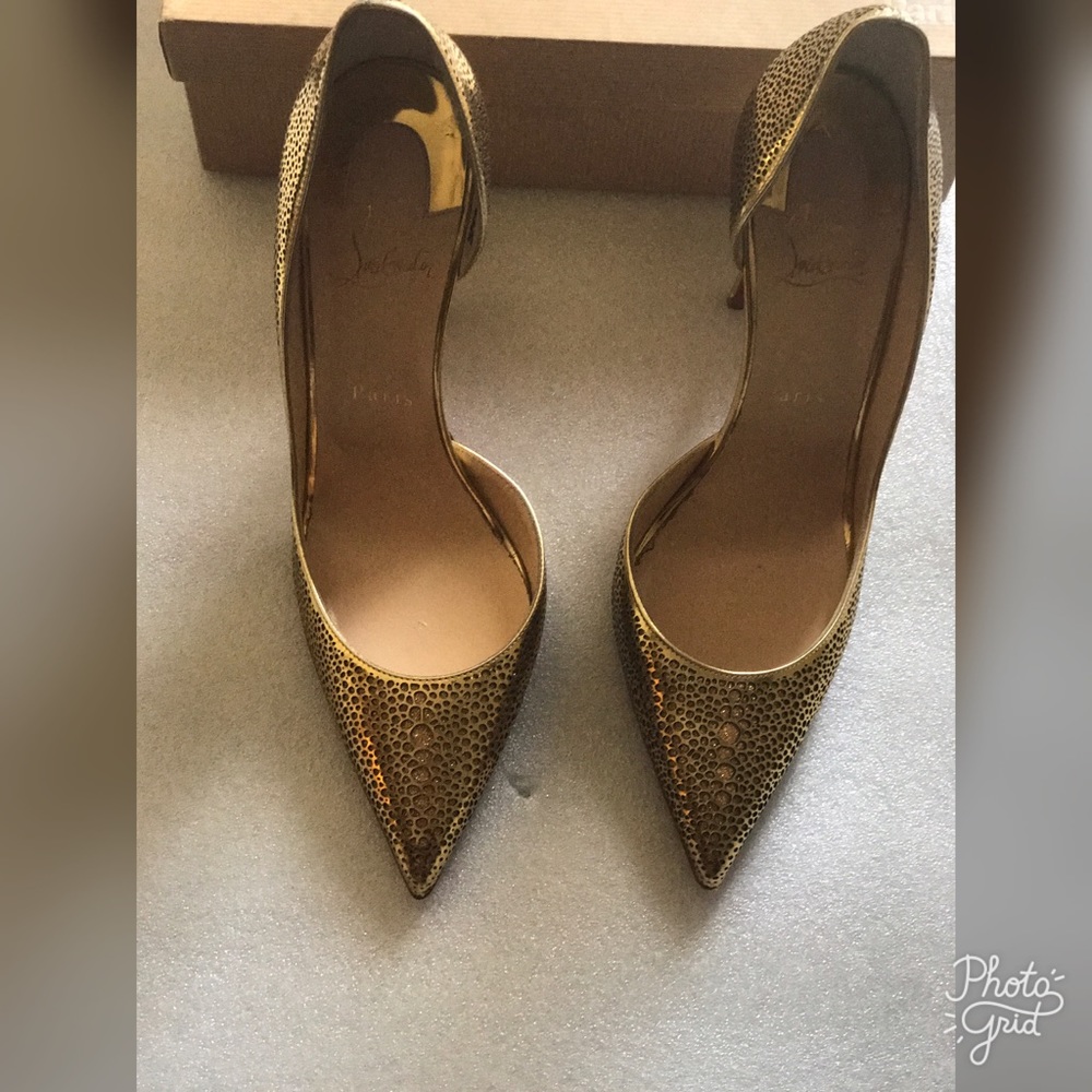 Gold laser Christian Louboutins size 39.