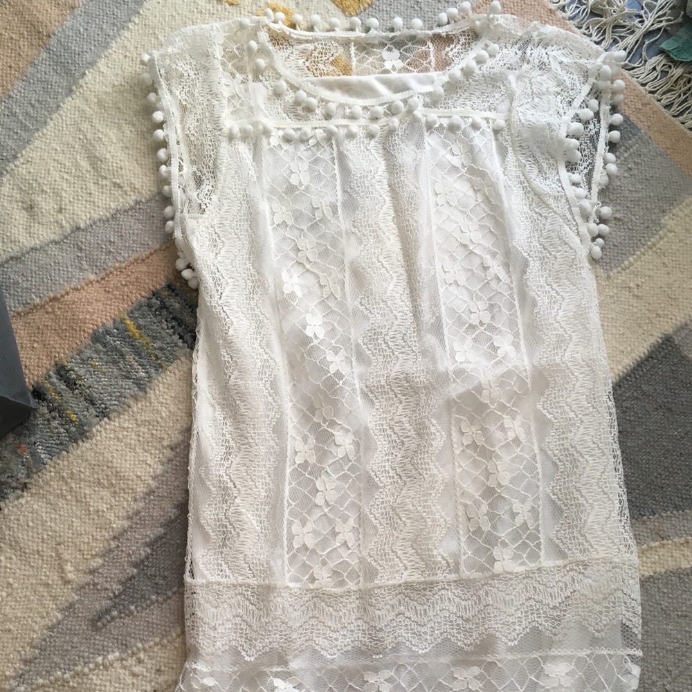 White lace tunic with Pom Pom trim