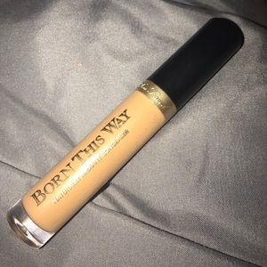 Born This Way concealer in the color "TAN"
