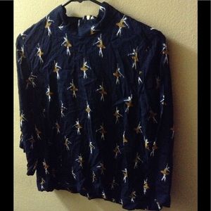 Ballerina print blouse.