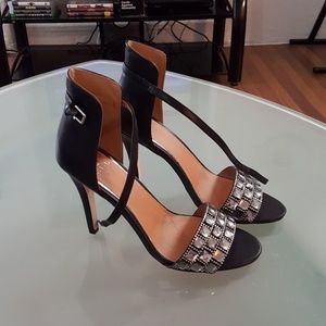 Black open toe heel with faux diamond cuffs.