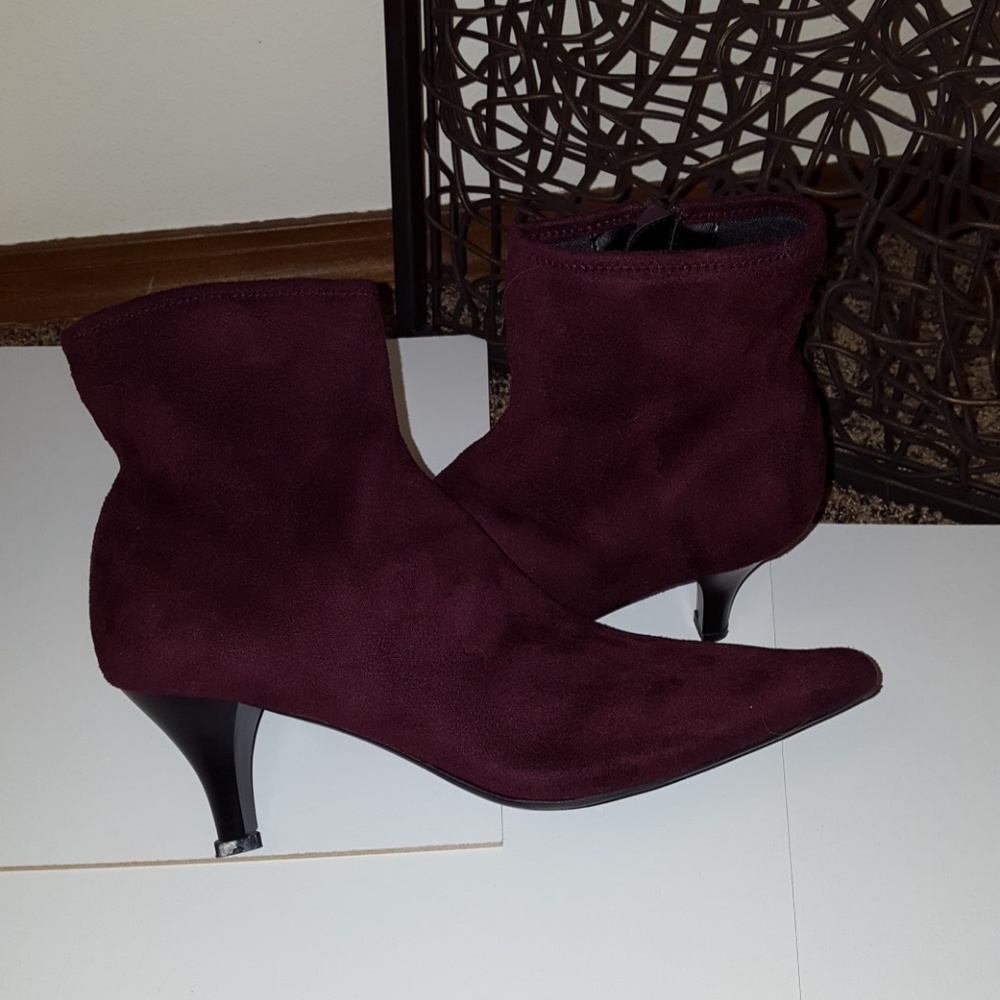 Deep plum colored boots. NEW. Never worn.