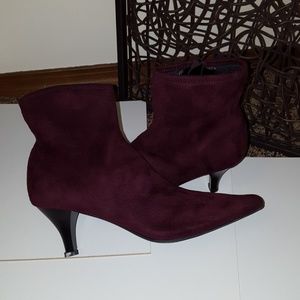 Deep plum colored boots. NEW. Never worn.