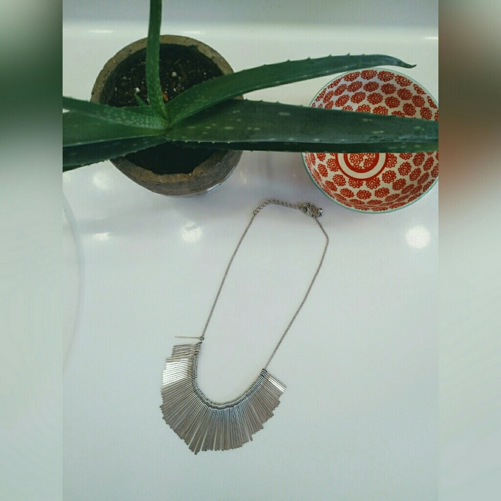 Silver sunburst necklace