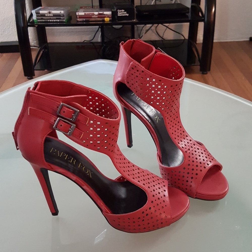 Red open toe heel with ankle strap.