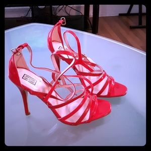 Red strapped open toe heel.