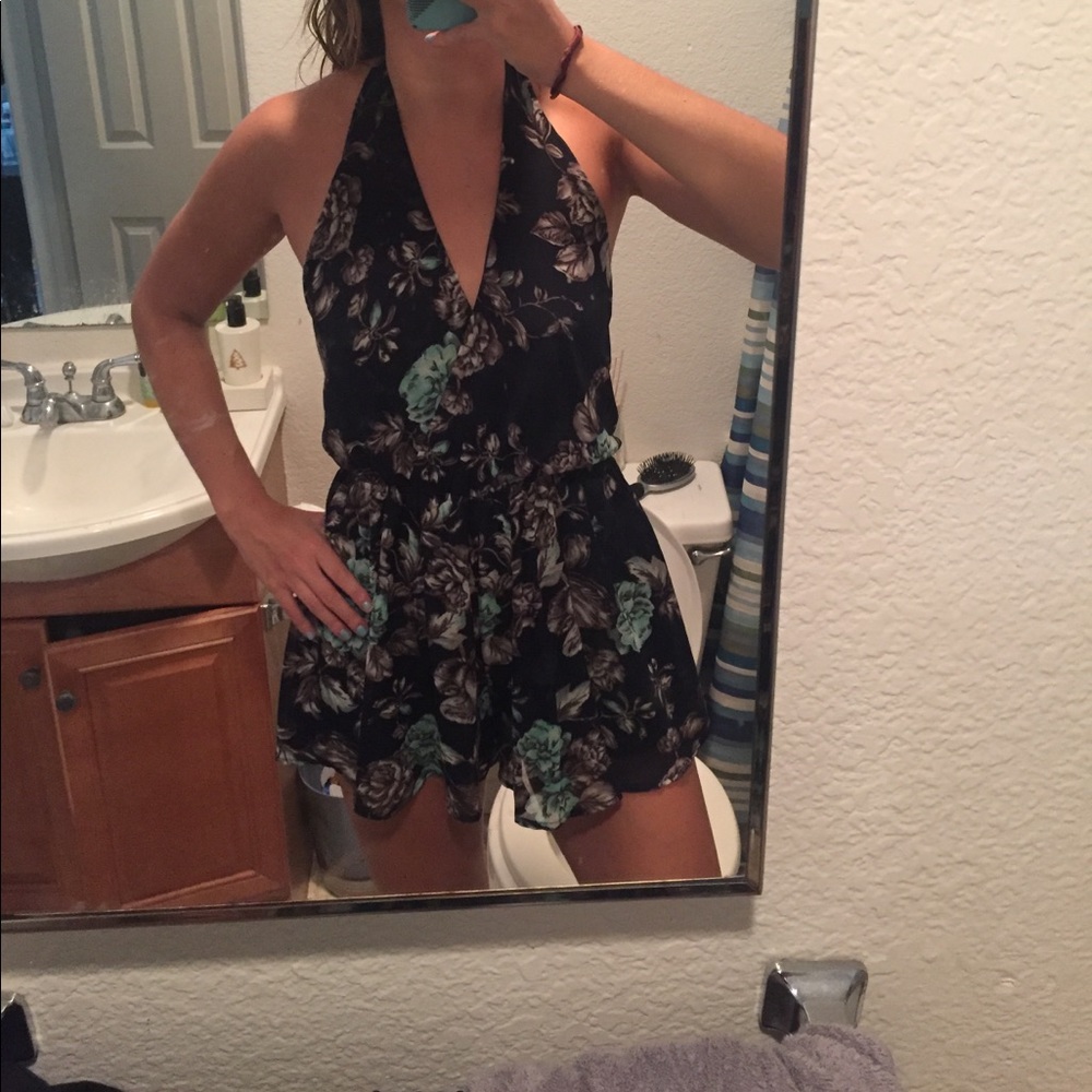 Floral navy blue open back halter romper