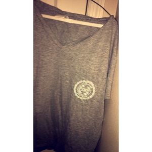 PINK (grey) shirt with blue writing