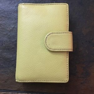 Snap closure yellow wallet