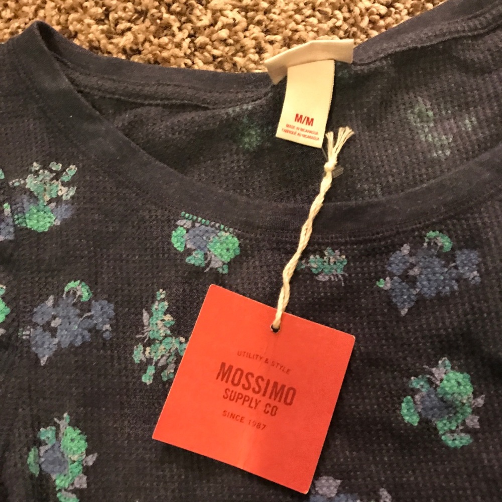 Long sleeved blue floral shirt