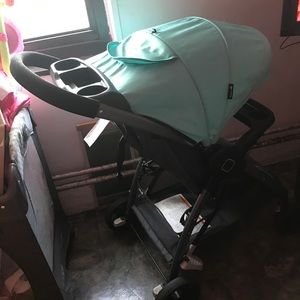 Safety first  mint green and black stroller unisex
