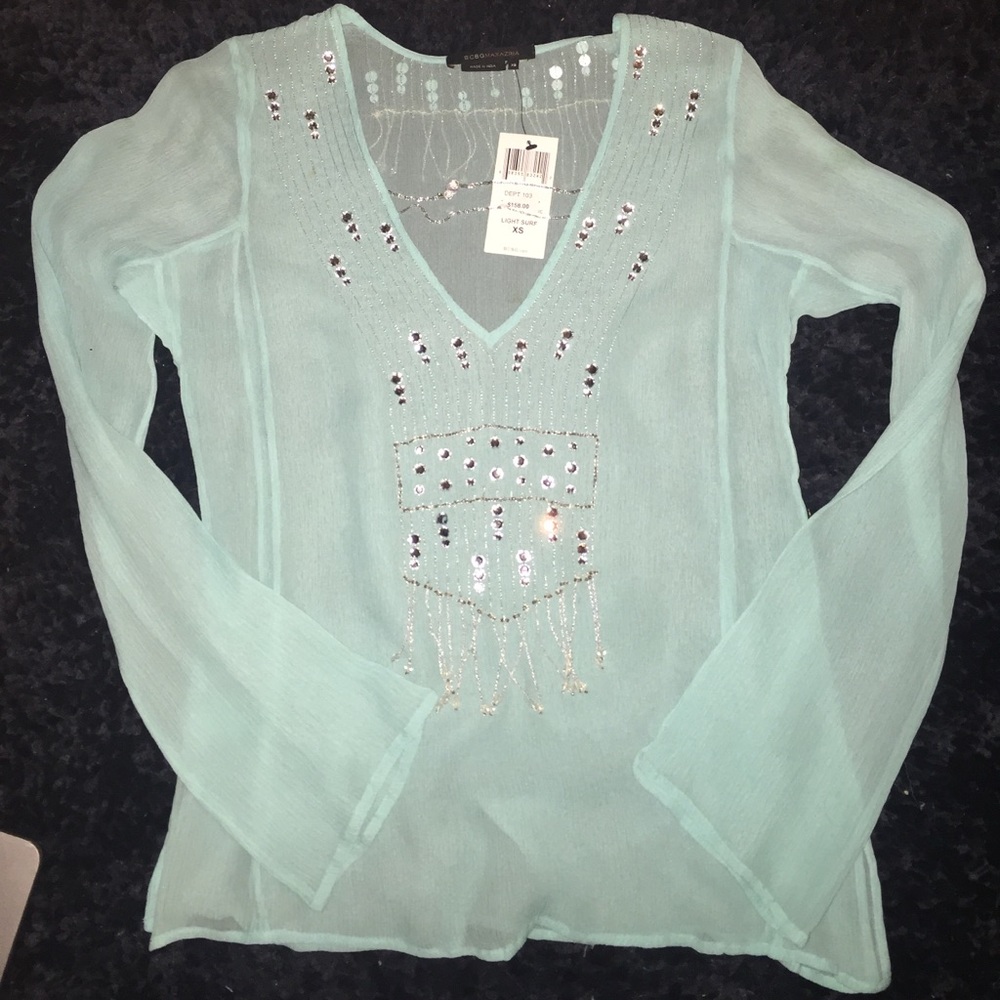BCBG beautiful teal blouse!! Still with tag!