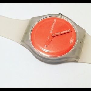 White band and orange face swatch.