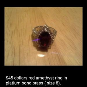 $45 dls red amethyst ring in platium bond brass