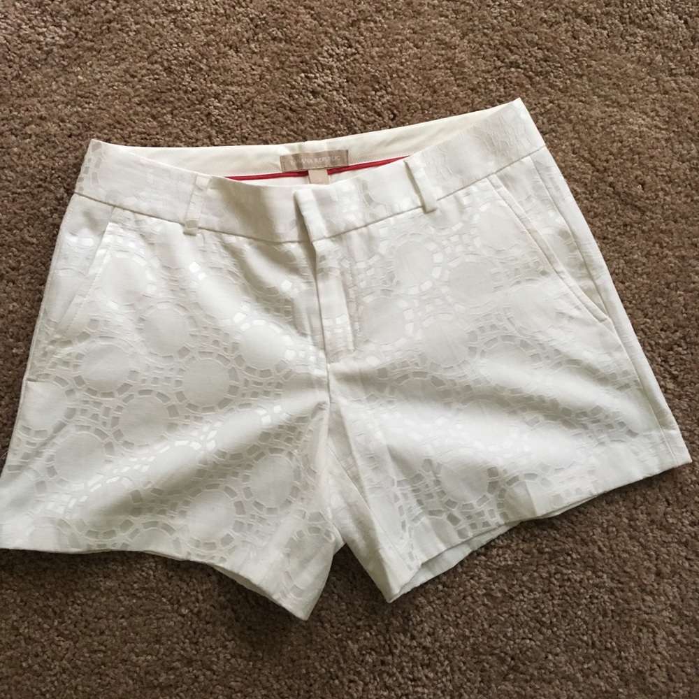 White, patterned shorts.