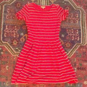 Short sleeved red dress with scalloped cream edges