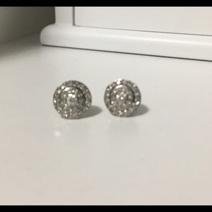 14k white gold diamond stud earrings.