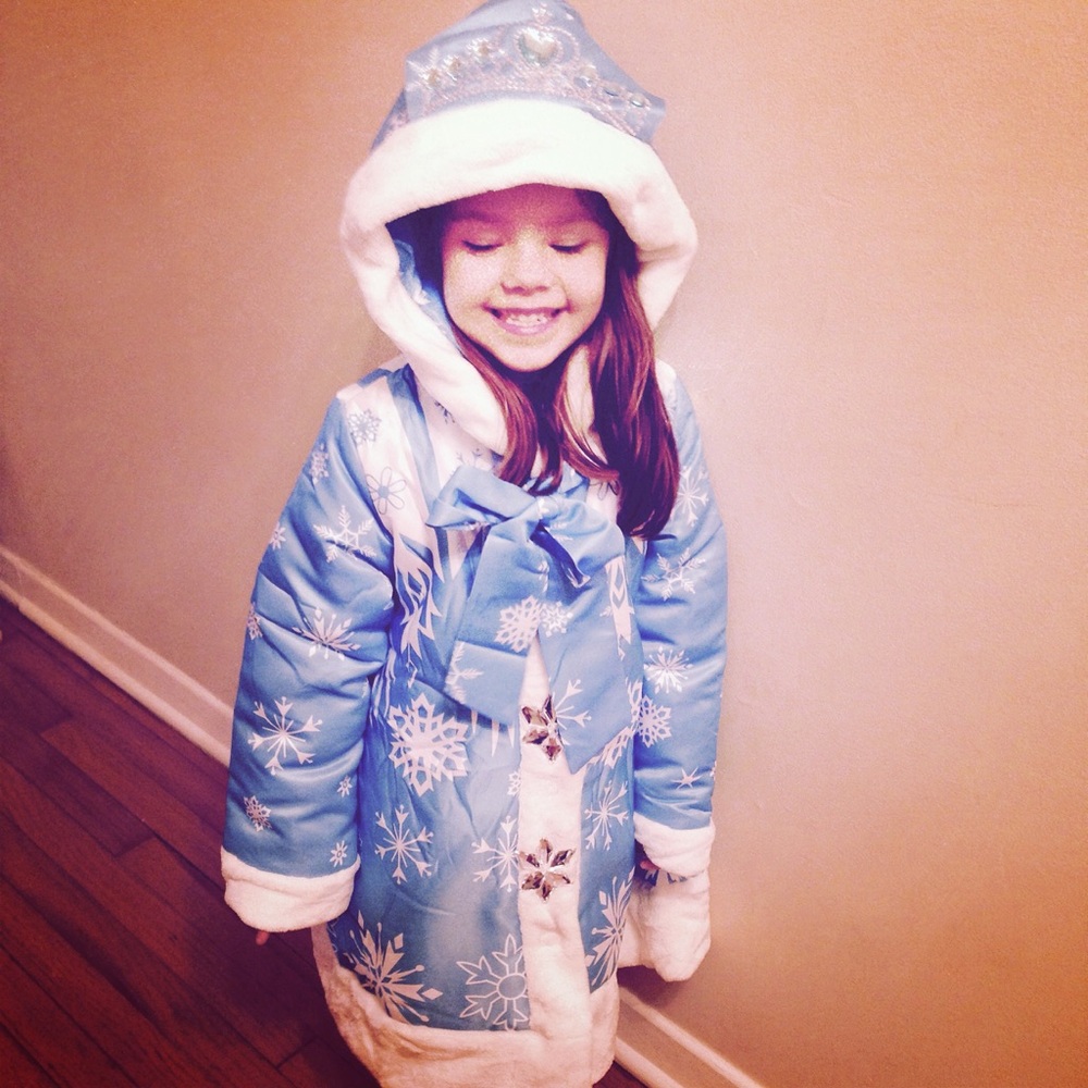 Boutique custom made Frozen jacket and headband.