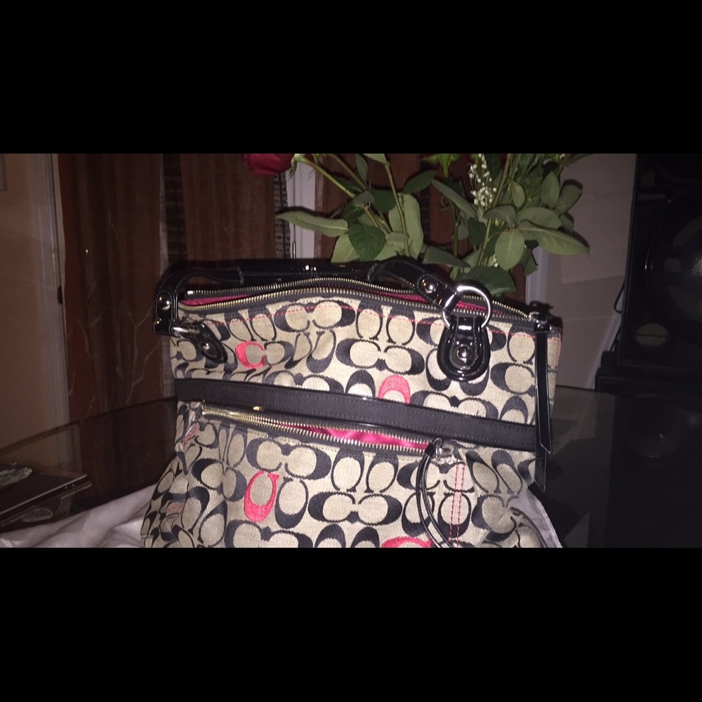 A multi colored coach bag