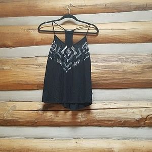Black express top with sequin detail. EUC