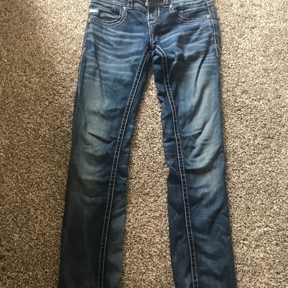 Buckle black skinny jeans