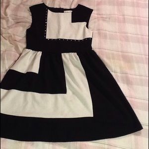 A black and white jeweled dress