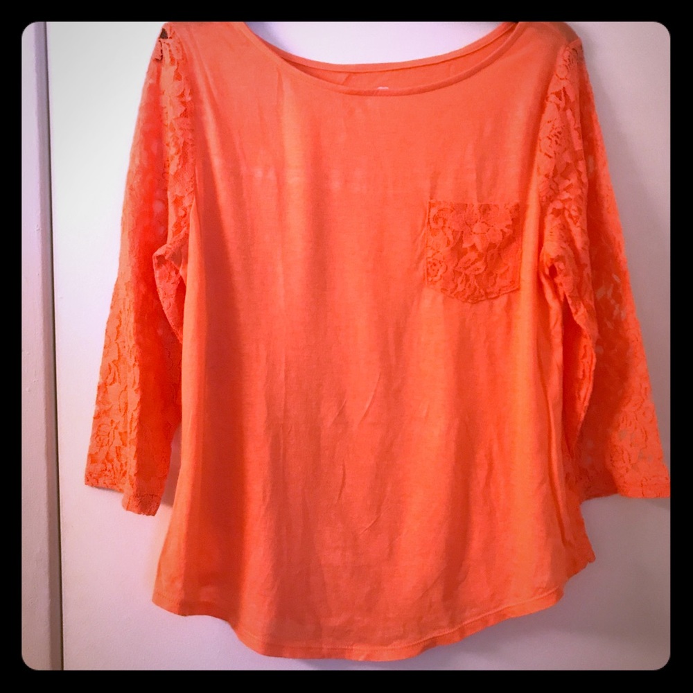 Beautiful peach top with lace sleeves and back.