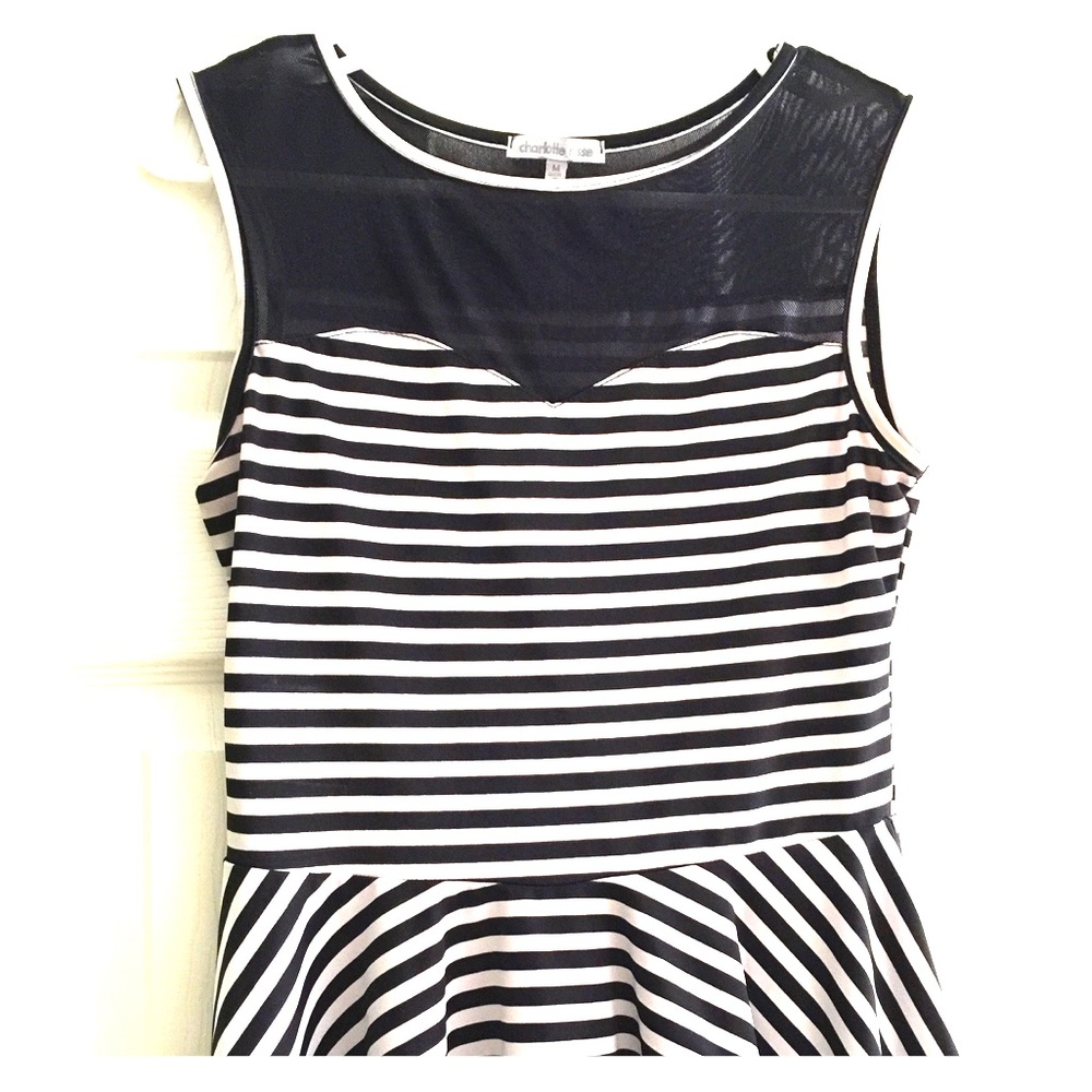 Trendy, peplum top w/ sheer