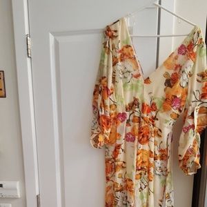 Floral sheer jumpsuit with 3/4 inch sleeves